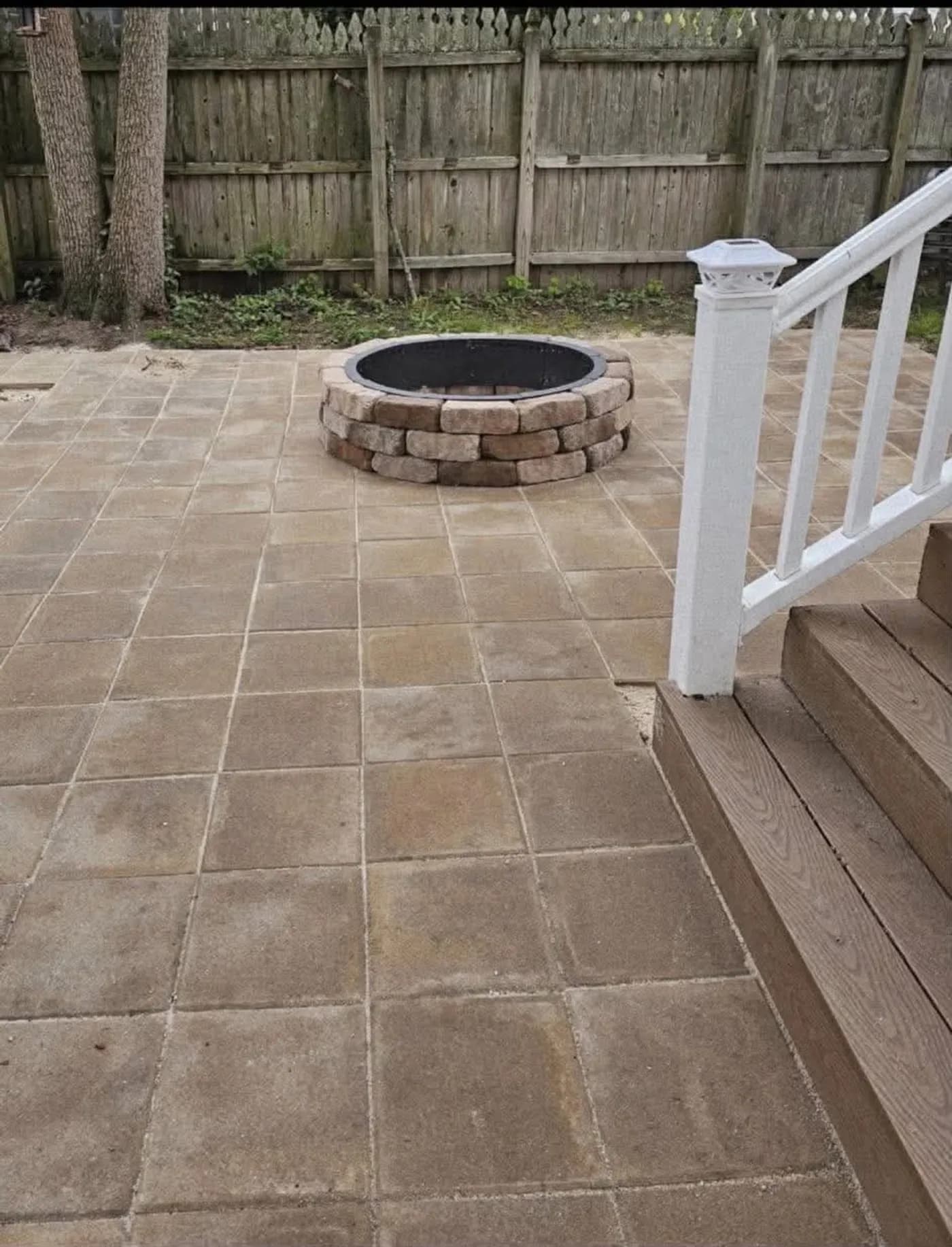 Paver patio with custom stone fire pit
